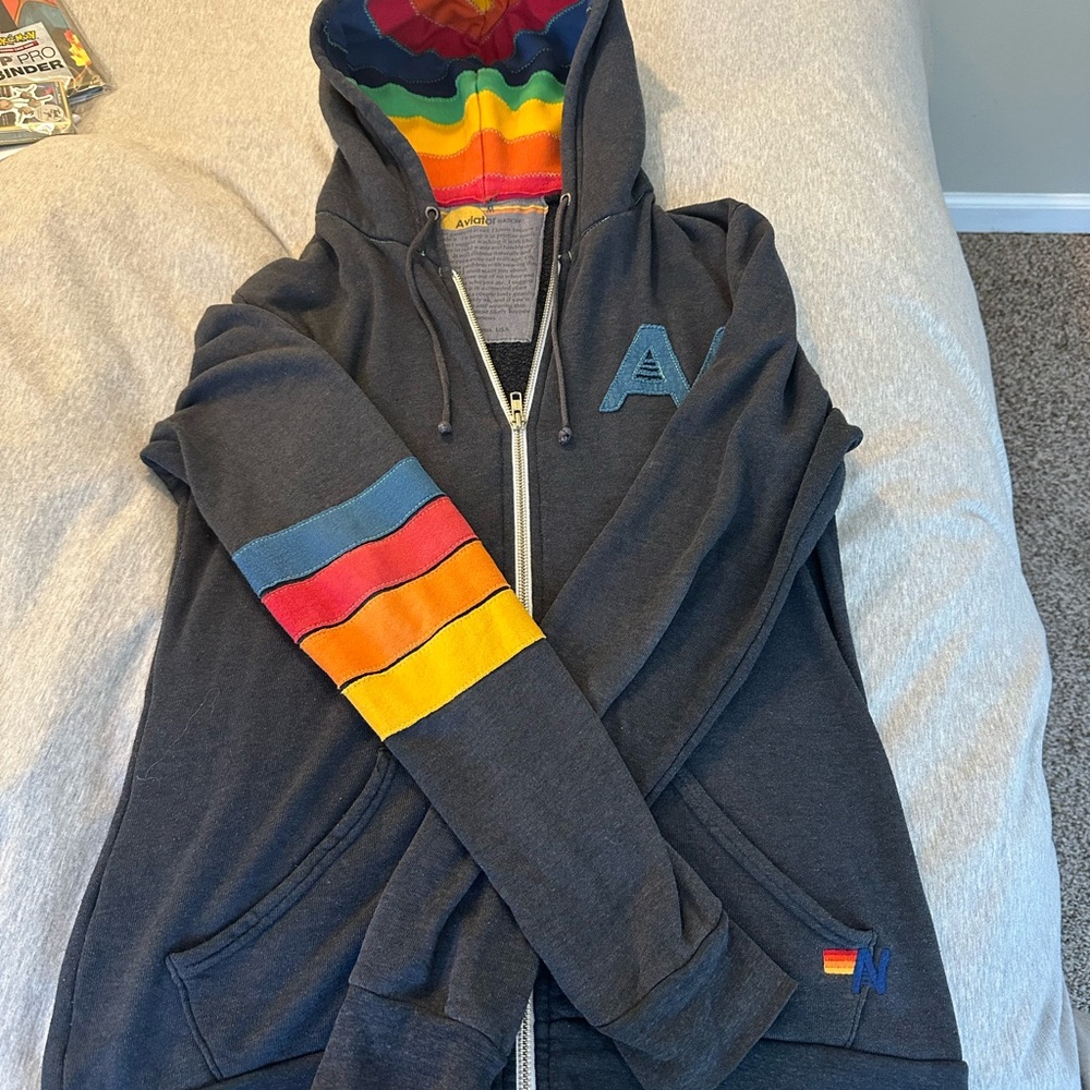 Gray Zip Up Sweater with Rainbow Hood and Striped Sleeve